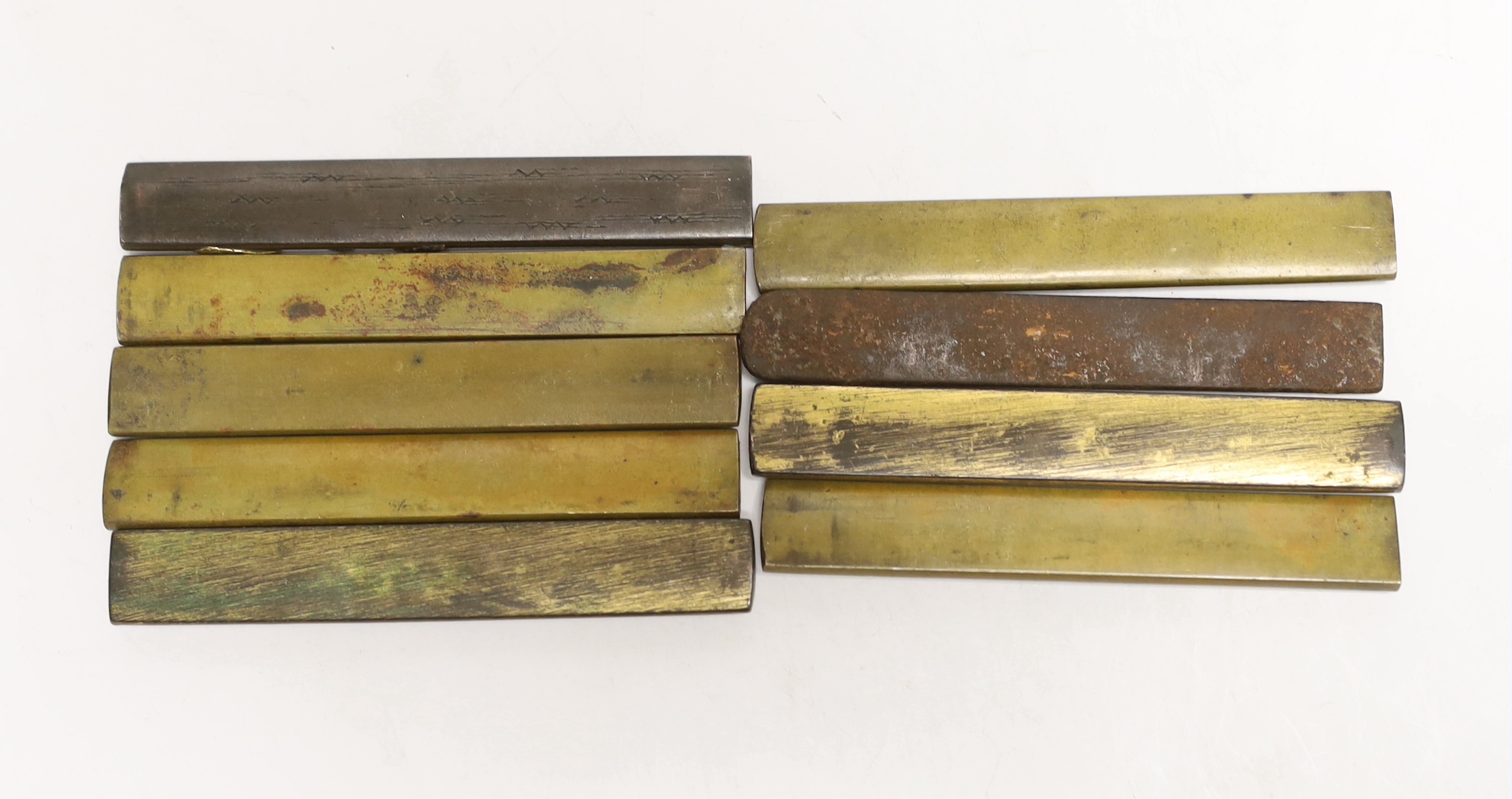 Nine Japanese mixed metal Kozuka knife handles, 19th century, each 9.5cm length